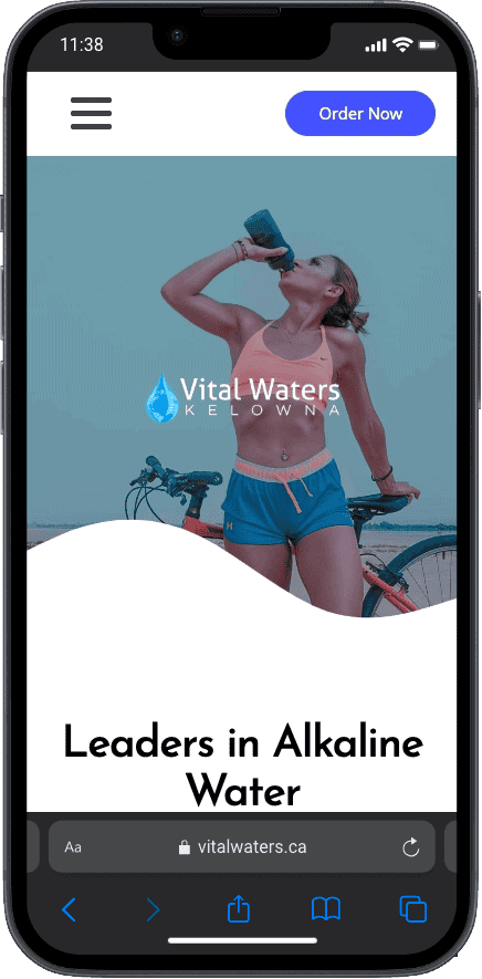 Woman drinking alkaline water next to a bike on Vital Waters Kelowna website homepage promoting leaders in alkaline water.