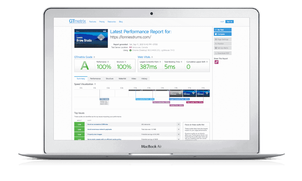 GTmetrix performance report displayed on a laptop, showcasing web hosting metrics like speed, performance, and structure.