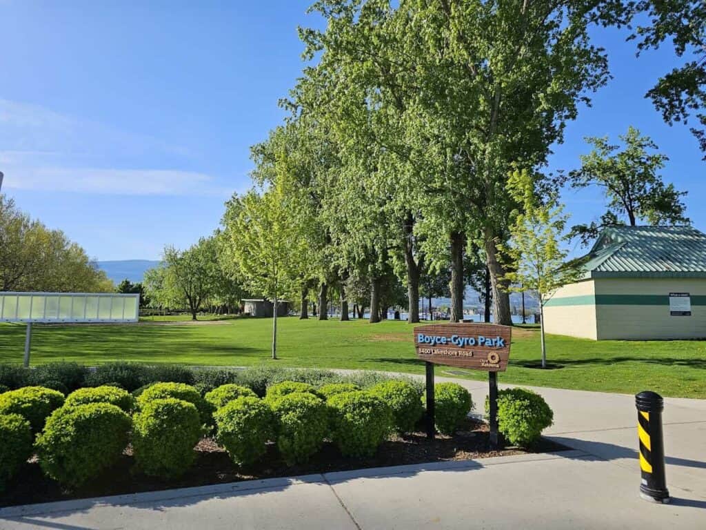 Looking down the picnic area at the Boyce Gyro Beach Park in Kelowna, BC